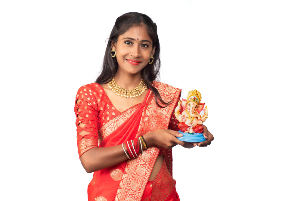 happy young indian girl posing with ganesha statue occasion ganesh festival